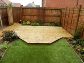 Decking and Artificial Lawn - Completed Decking with shaped borders and artifical lawn