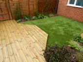Decking and Artificial Lawn - Existing plants were lifted and replanted into the new borders
