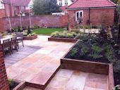 Norwich Garden Design - Raised beds with new planting, stepped patio and decking