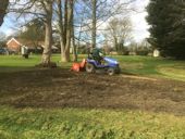 Preparing the seed bed, rotovating, raking and levelling